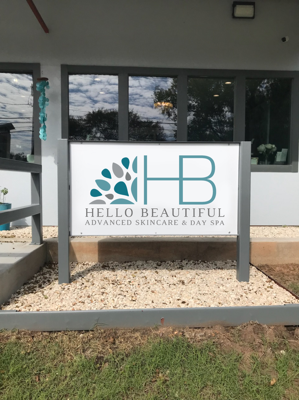 Exterior sign at Hello Beautiful Advanced Skincare & Laser Studio in Columbus, TX