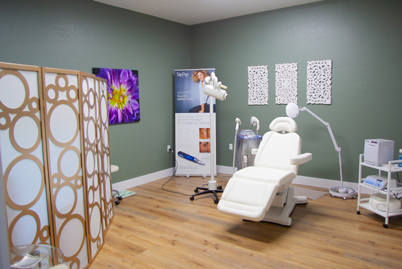 Med spa treatment room with SkinPen display